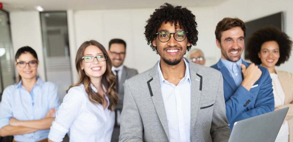 office staff smiling for a picture